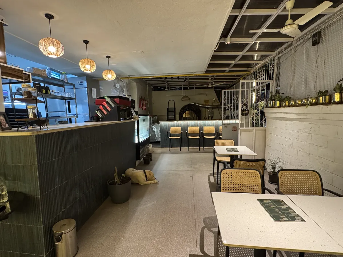 Cafe Orelo coffee counter and wood-fired oven